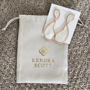 Kendra Scott Tulip Drop earrings in rose gold metal with mother of pearl stone.